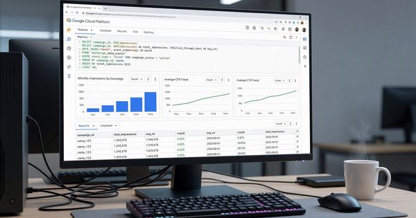 BigQuery console with marketing analytics SQL query and results dashboard on developer workstation